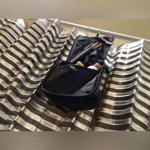 Herve Leger toiletry bag